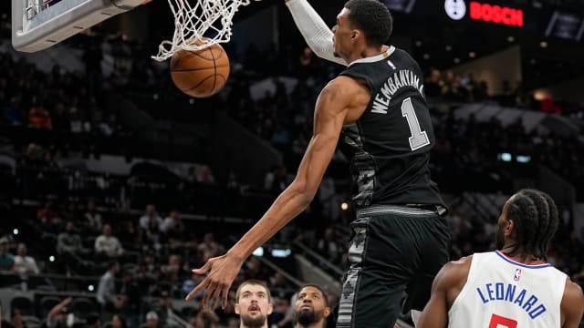 Nov 22, 2023; San Antonio, Texas, USA; San Antonio Spurs forward Victor Wembanyama (1) dunks during the second half against the Los Angeles Clippers at Frost Bank Center.